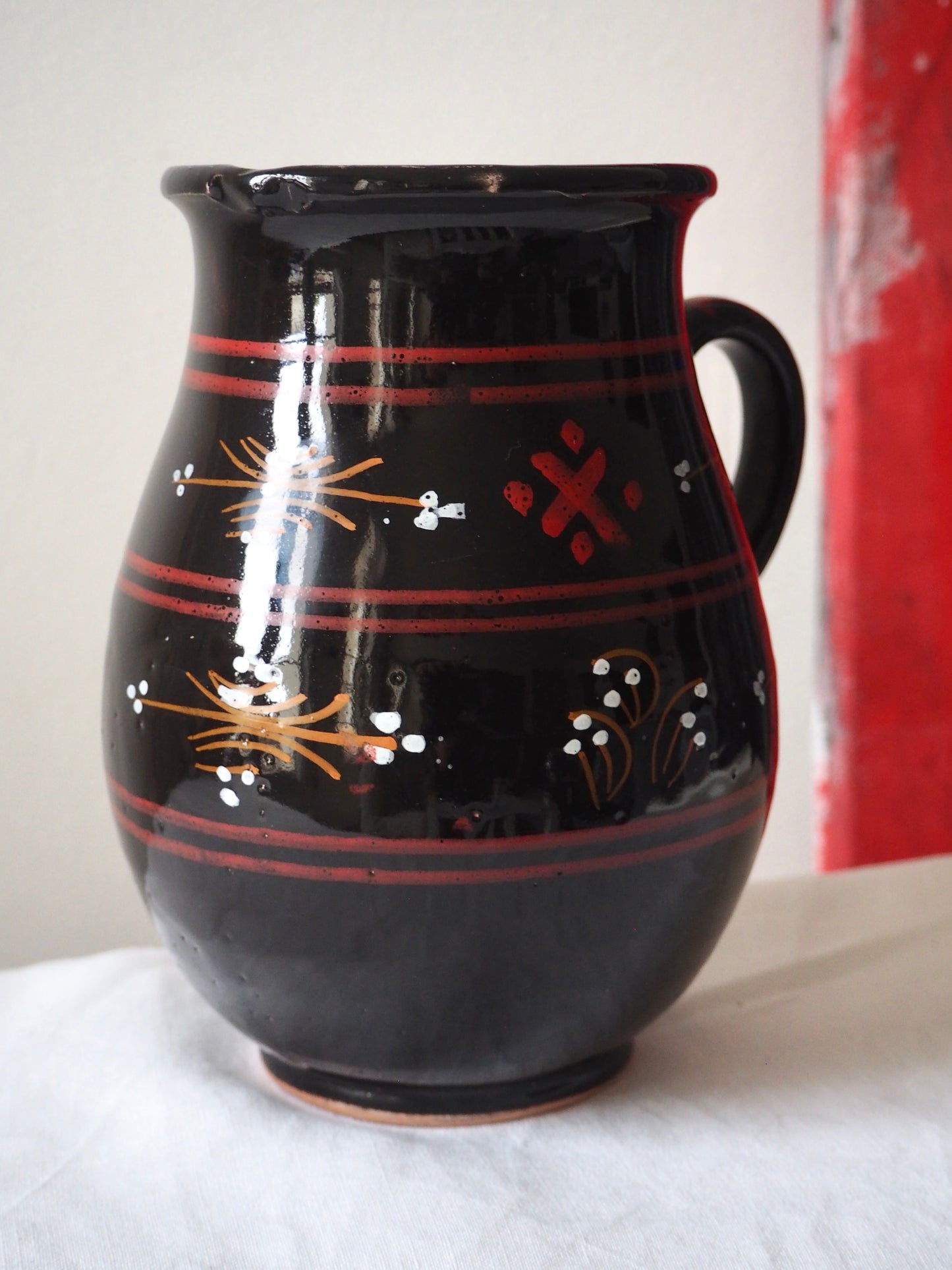 Le pichet en terre cuite