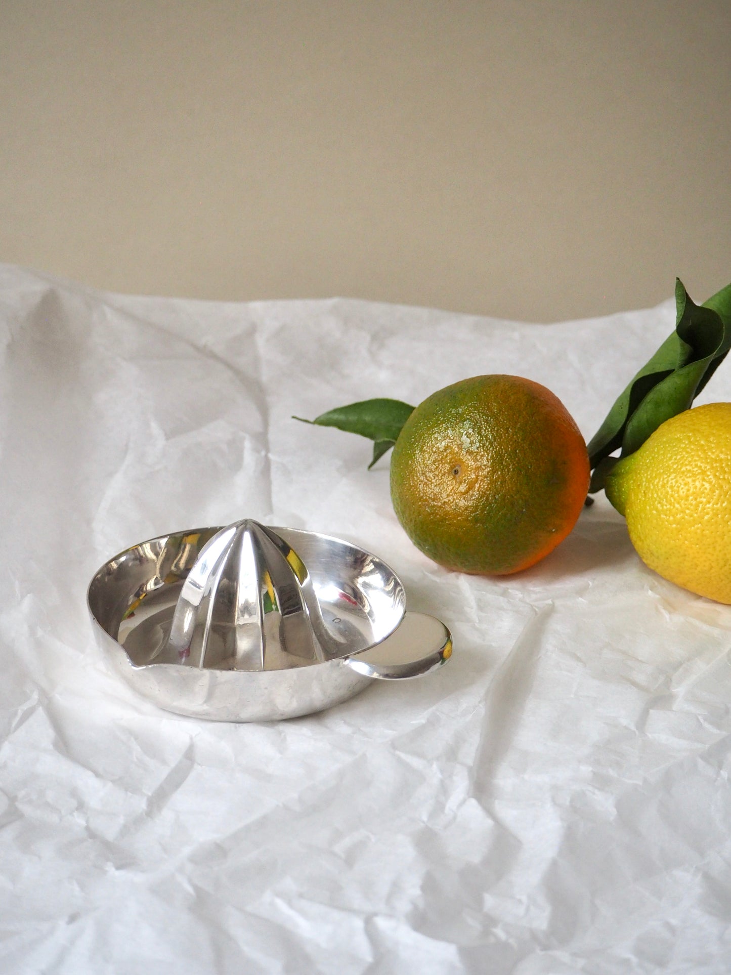 Presse agrume en argent massif