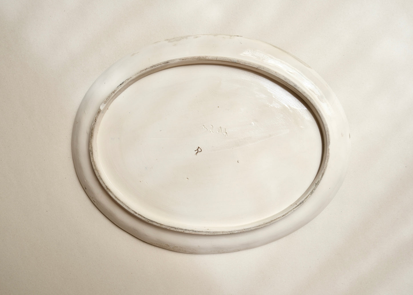 Le plat oval bleu nuit
