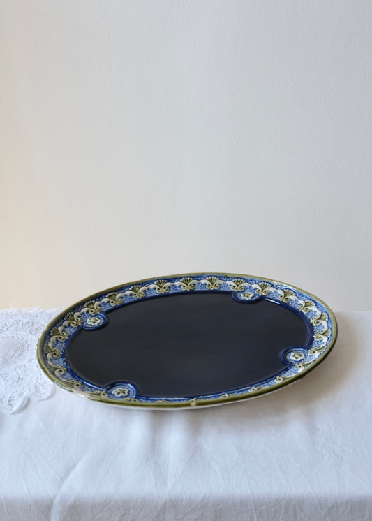 Le plat oval bleu nuit
