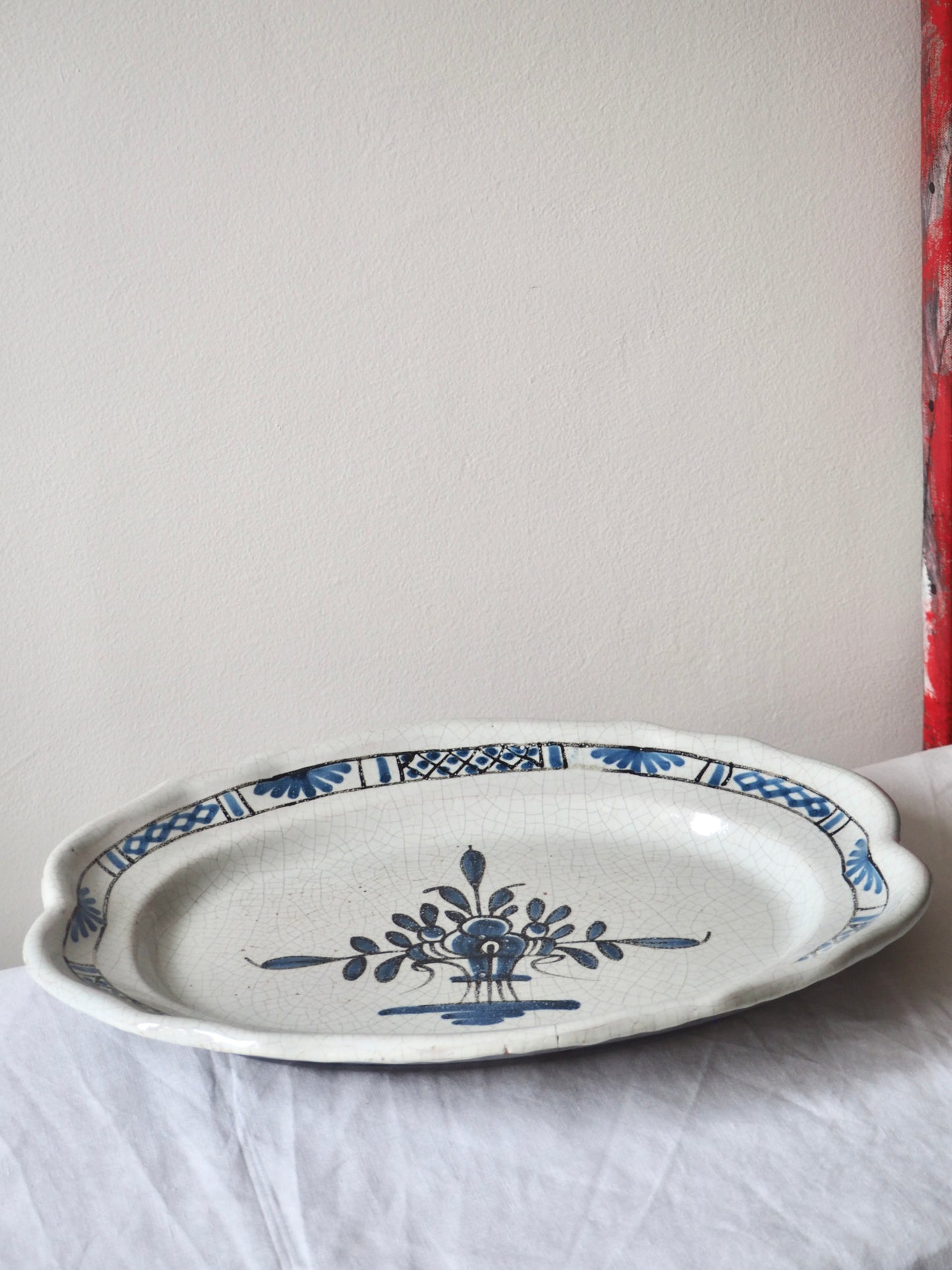 Le plat cul noir en faïence de Rouen