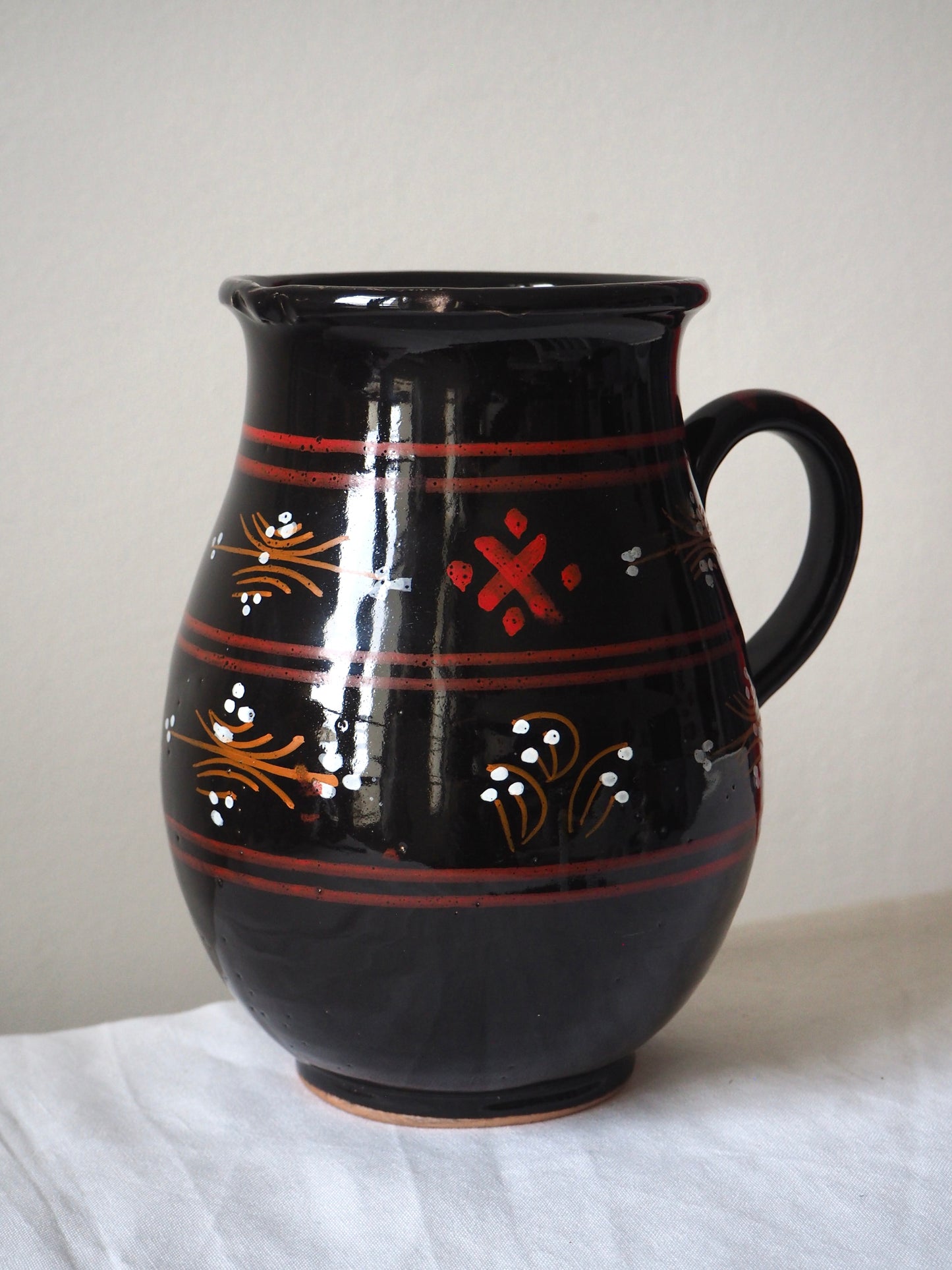 Le pichet en terre cuite