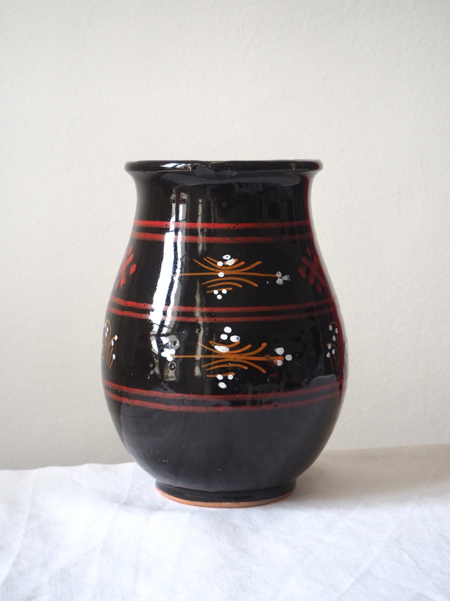 Le pichet en terre cuite