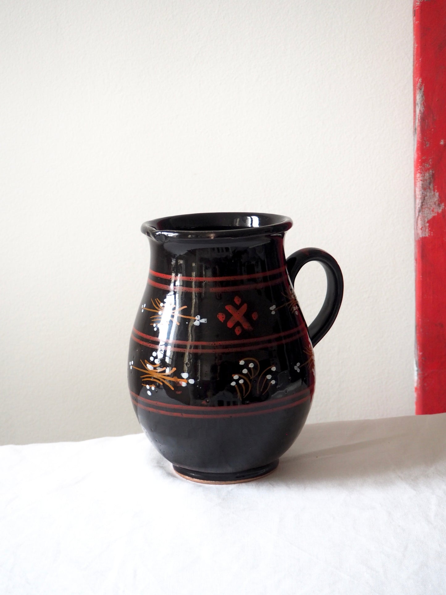 Le pichet en terre cuite