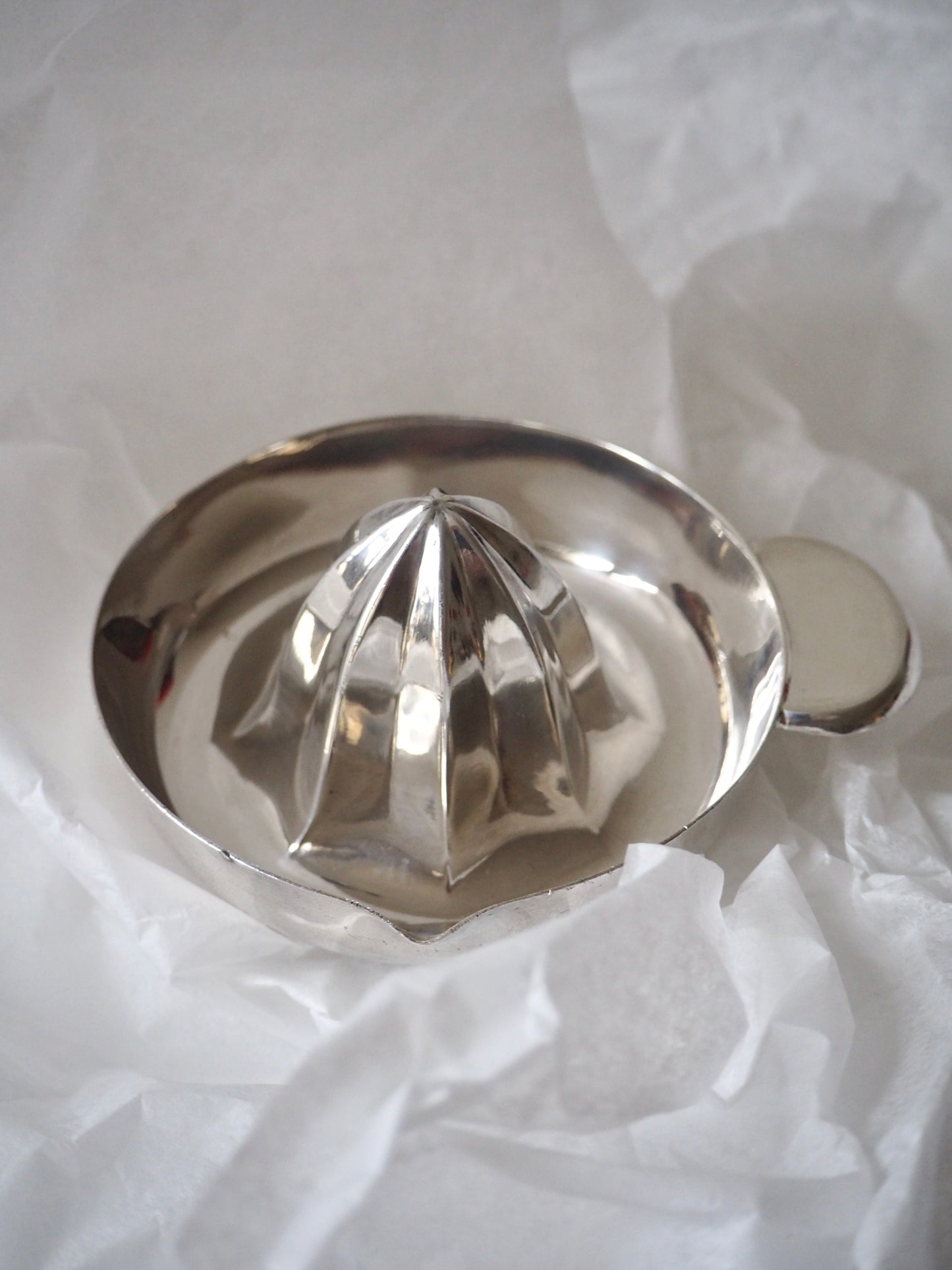 Presse agrume en argent massif