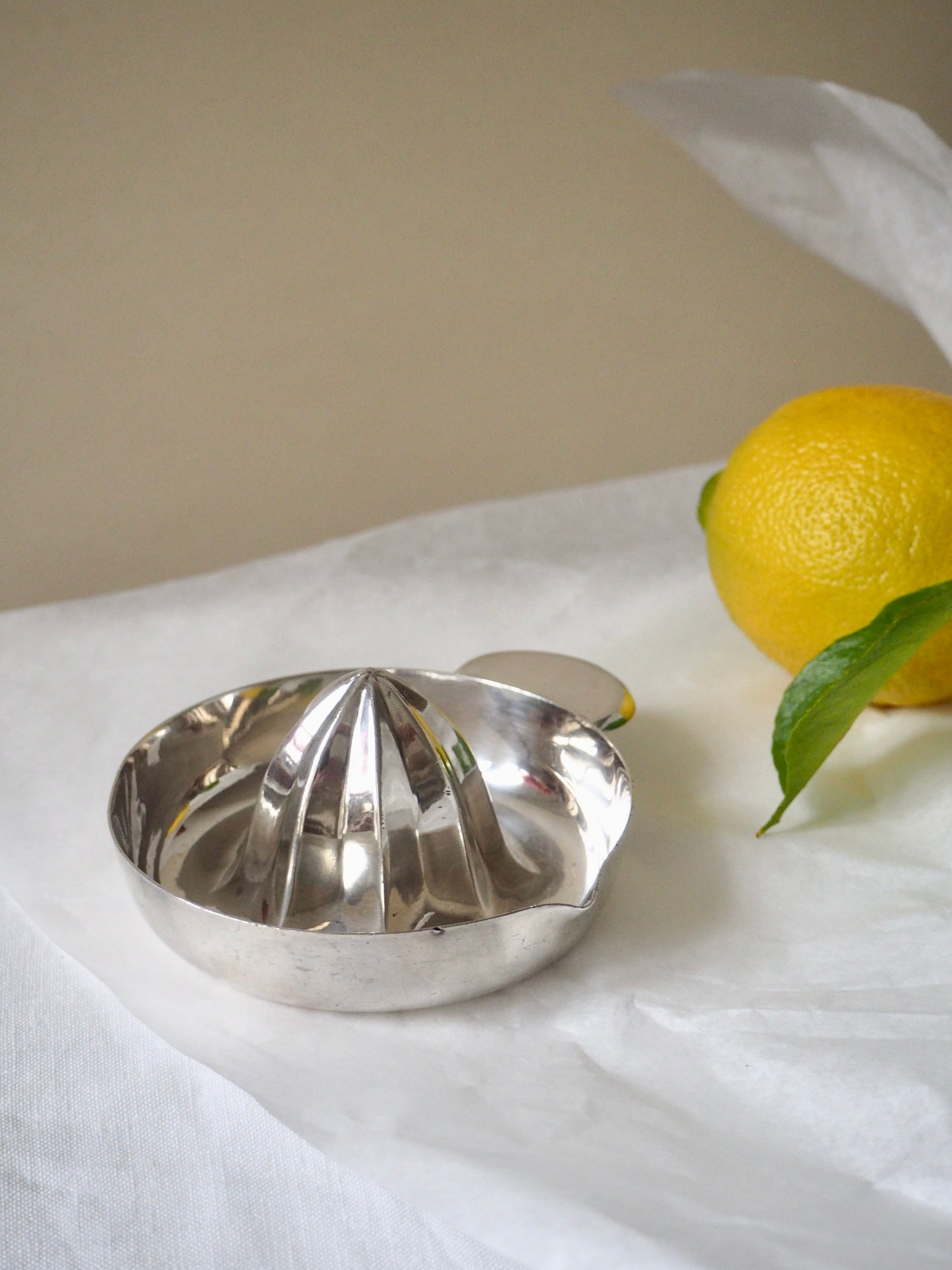 Presse agrume en argent massif