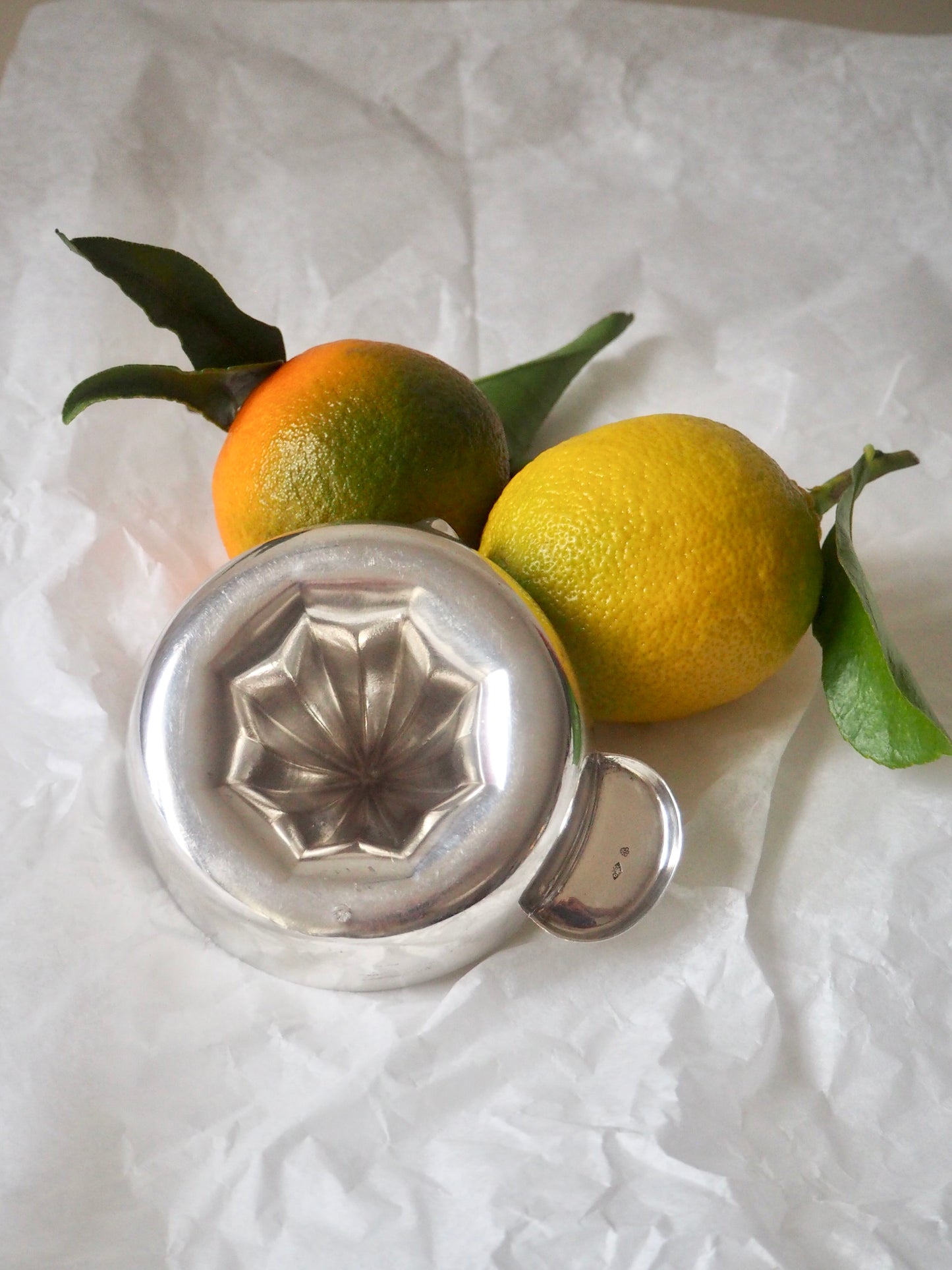 Presse agrume en argent massif