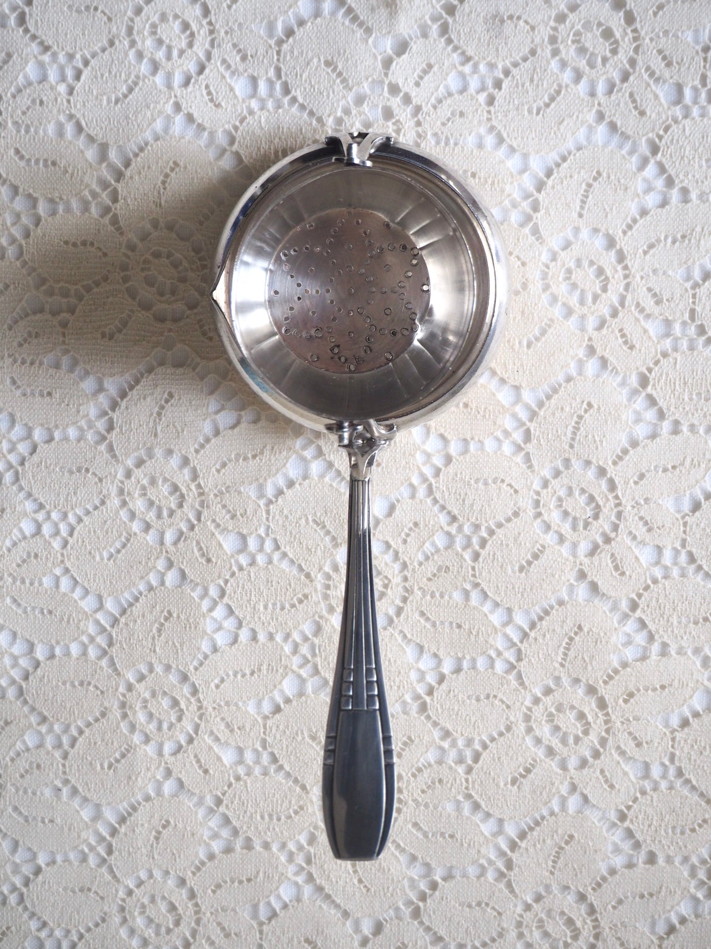 Passoire à thé en métal argenté