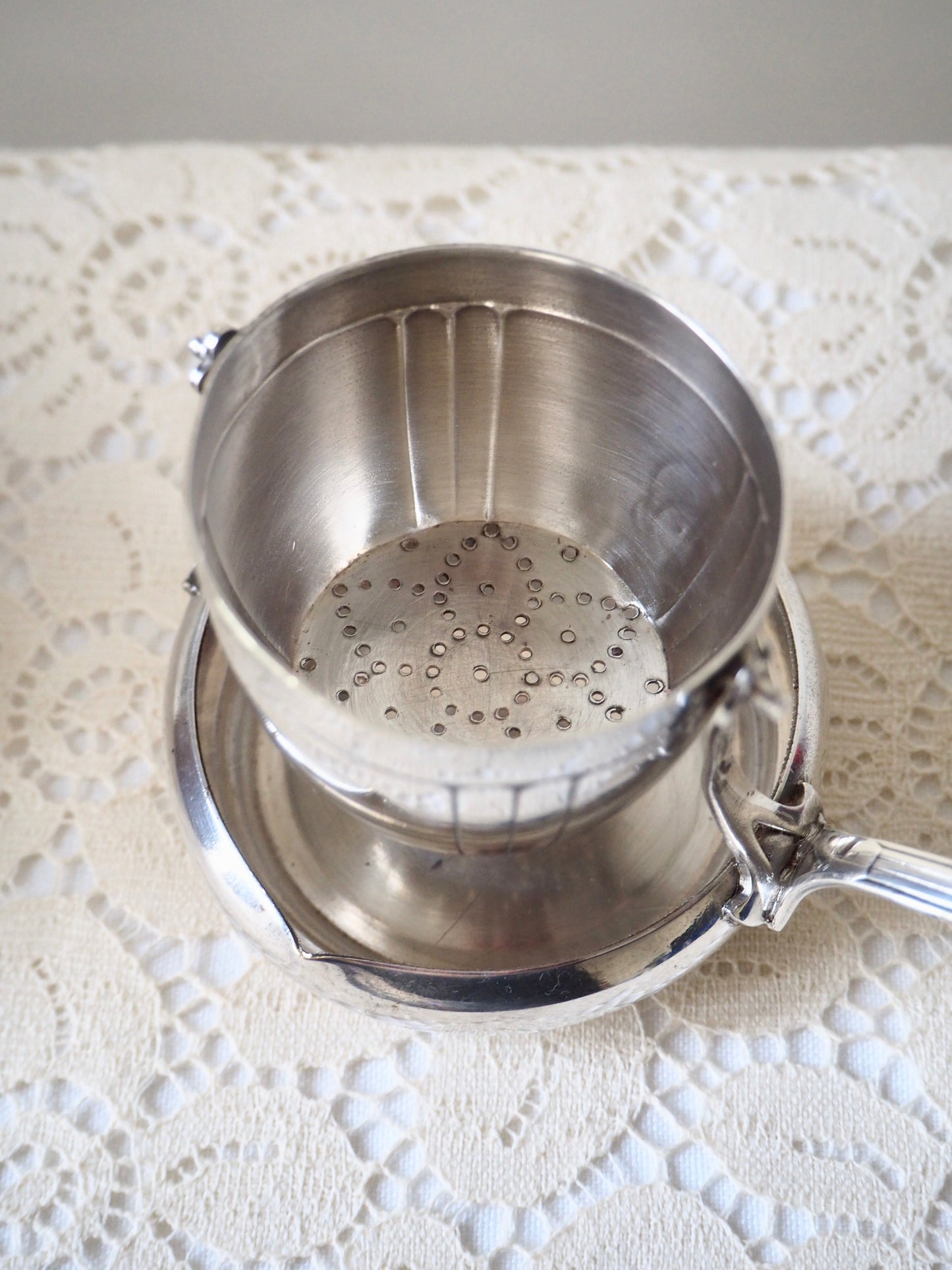 Passoire à thé en métal argenté